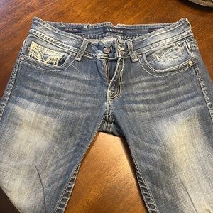 TWO pairs of Vigos capris